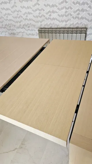 Taula de menjador extensible