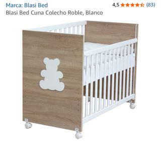 Cuna infantil con móvil y osito