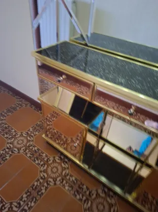 Mueble recibidor cristal y metal dorado