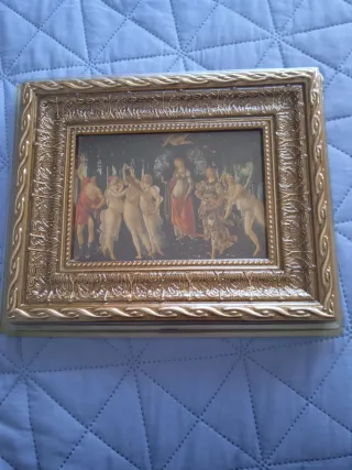 Quadro con cornice dorata