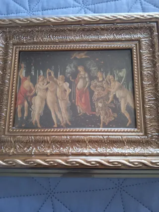 Quadro con cornice dorata