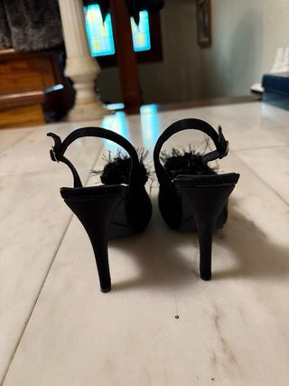 Zapatos negros destalonados con plataforma