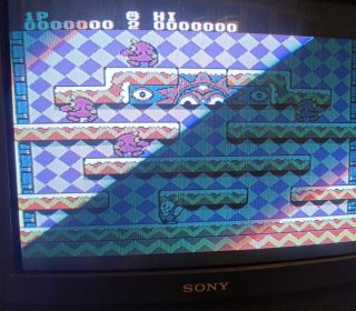Snow BrosNES, caja, cartucho y manual r3pr0.