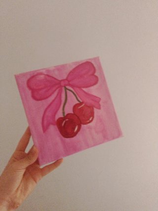 Pintura acrílica de cerezas y lazo rosa