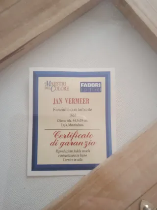 Quadro con cornice dorata