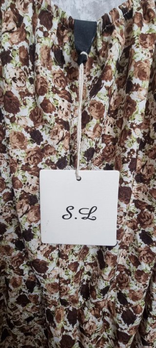 Abito floreale senza schienale