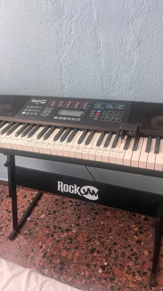 Teclado Rock Jam 61 teclas, con patas.