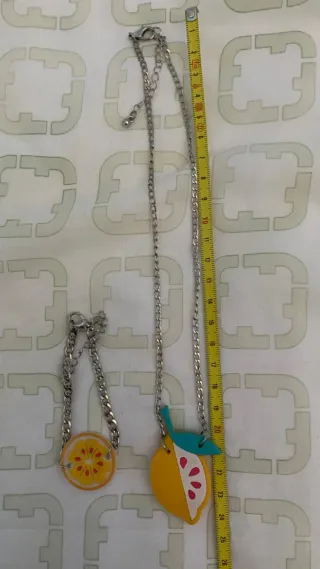 Parure collana e bracciale frutta