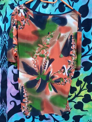 4 BLUSAS ESTAMPADAS DISTINTAS TALLAS:1X2,5€