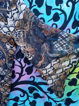 4 BLUSAS ESTAMPADAS DISTINTAS TALLAS:1X2,5€