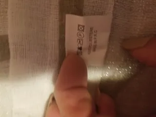 Tende da finestra oro e bianche