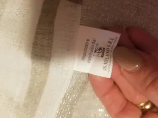 Tende da finestra oro e bianche