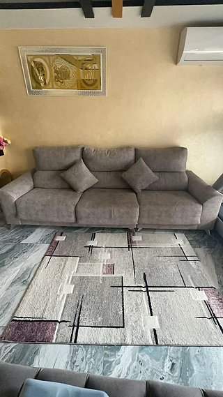 Sofá de tela gris