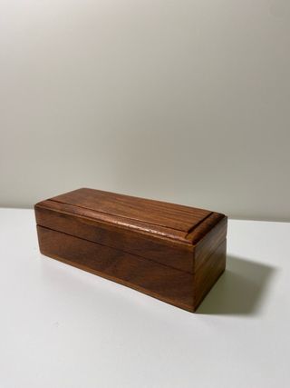Catalejo antiguo con caja de madera