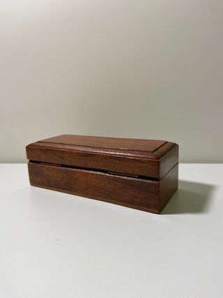 Catalejo antiguo con caja de madera