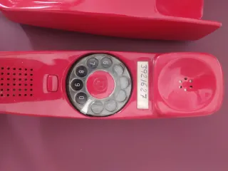 Teléfono antiguo góndola rojo