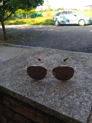 Gafas de sol Gucci doradas