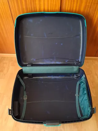 2 maletas azules con detalles turquesa