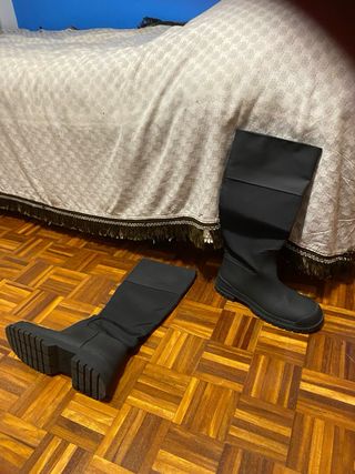 Botas altas negras de agua