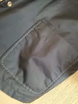 Chubasquero reversible gris y blanco