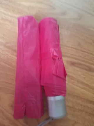 Paraguas fucsia plegable