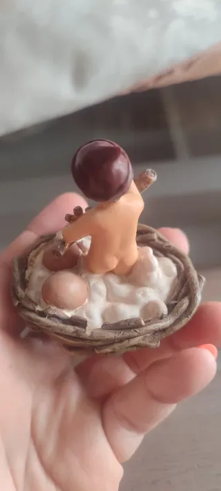 Figura ángel  en nido