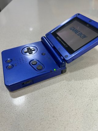 GBA SP Azul + Cargador + Bateria NUEVA