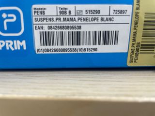 Sujetador de suspensión blanco negro y beis