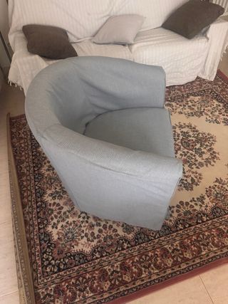 Sillón con funda gris