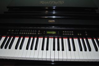 Piano en perfectas condiciones.