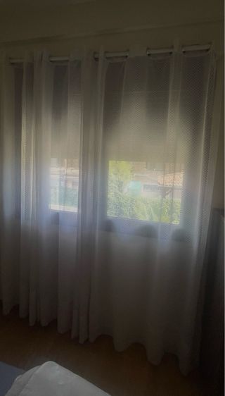 Cortinas de tela blancas y transparentes