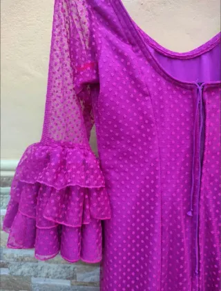 Vestido de flamenca buganvilla con un solo uso.