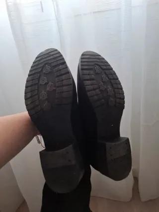 Botas altas negras con cordones