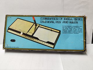 Rubrica da scrivania con calendario e penna