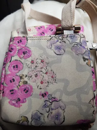 Bolso Tous floral rosa y morado