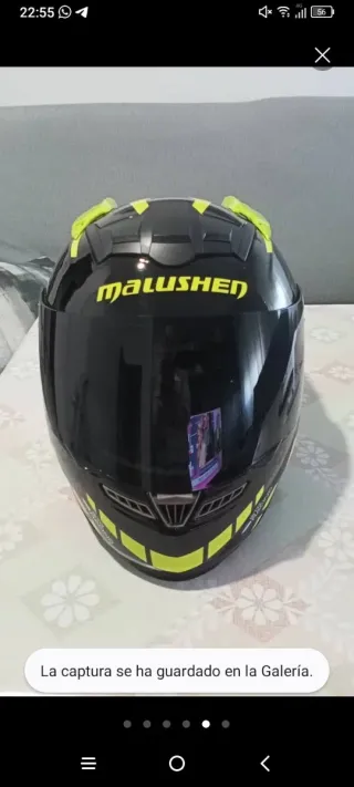 Casco de moto negro y amarillo,azul y negro,verde
