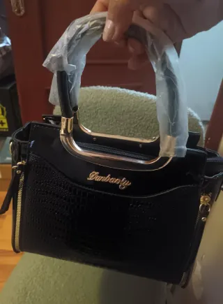 Bolso de mano negro charol