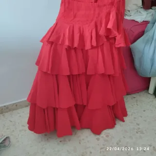 Traje de flamenca rojo con flecos