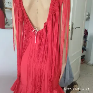 Traje de flamenca rojo con flecos