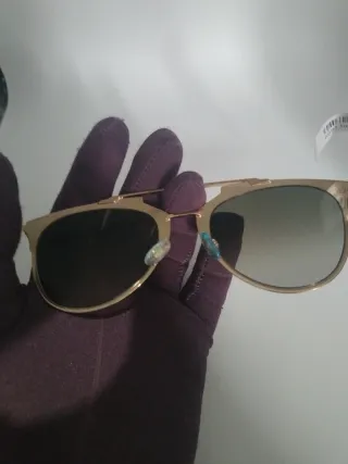 Gafas de sol Dior doradas y grises
