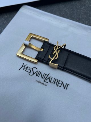 Cintura YVES SAINT LAURENT nera con fibbia oro
