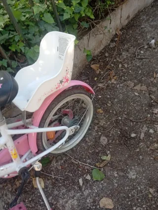 Bicicleta infantil Btwin rosa y blanca