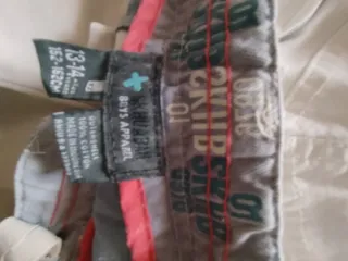 Pantalones cargo beige chico