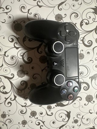 PS4 (PlayStation 4) Negra + Cascos y Juegos