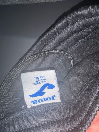 Chándal corto Joma negro esta los camales cortados
