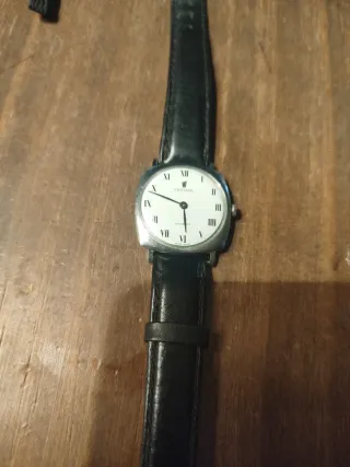 Reloj antiguo plateado y negro