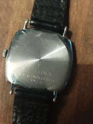 Reloj antiguo plateado y negro