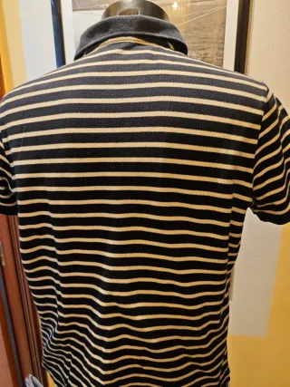 Polo de rayas náutico