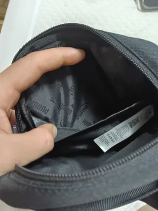 Bandolera Puma Negra con etiqueta