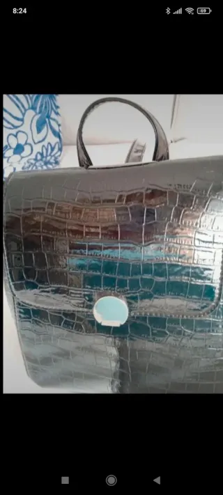 Mochila Stradivarius negra efecto piel